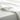 Close-up of white satin fabric with folds