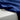 Close-up of blue fabric draped over a white surface